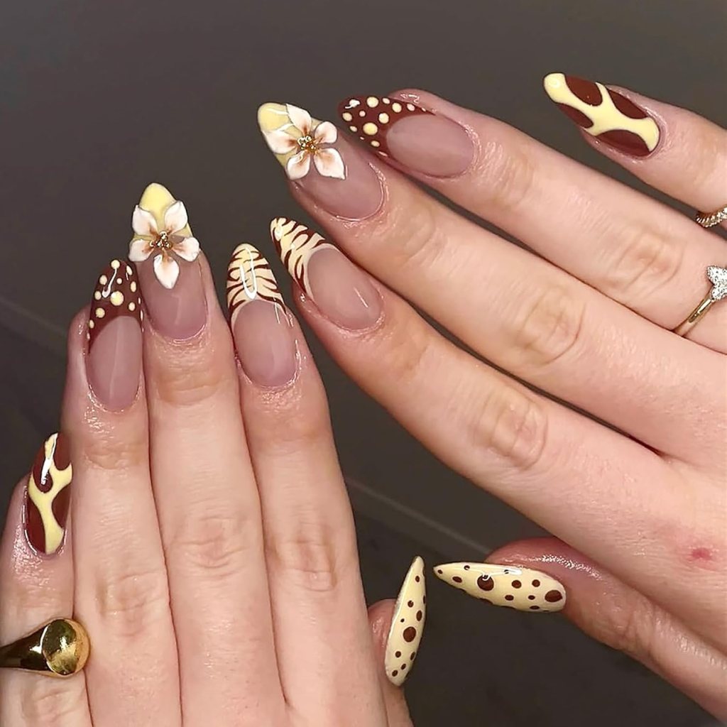 Butter yellow and brown abstract nails with floral accent nail art and glossy almond shaped manicure design
