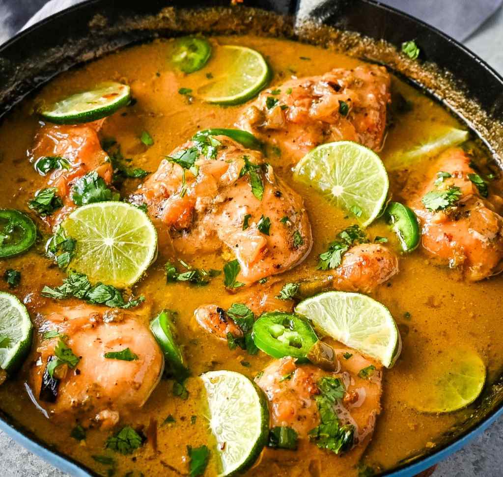 Coconut lime chicken in a creamy sauce with fresh lime for a flavorful summer dinner.
