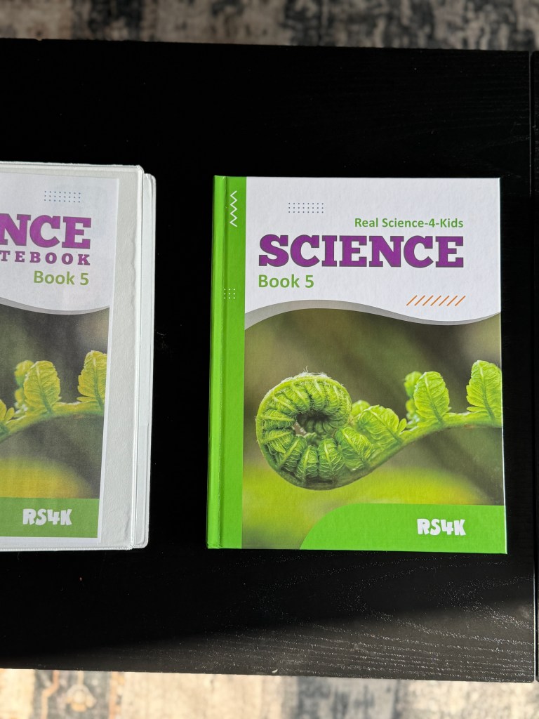 Real Science-4-Kids Book 5 student textbook with colorful illustrations for homeschool science