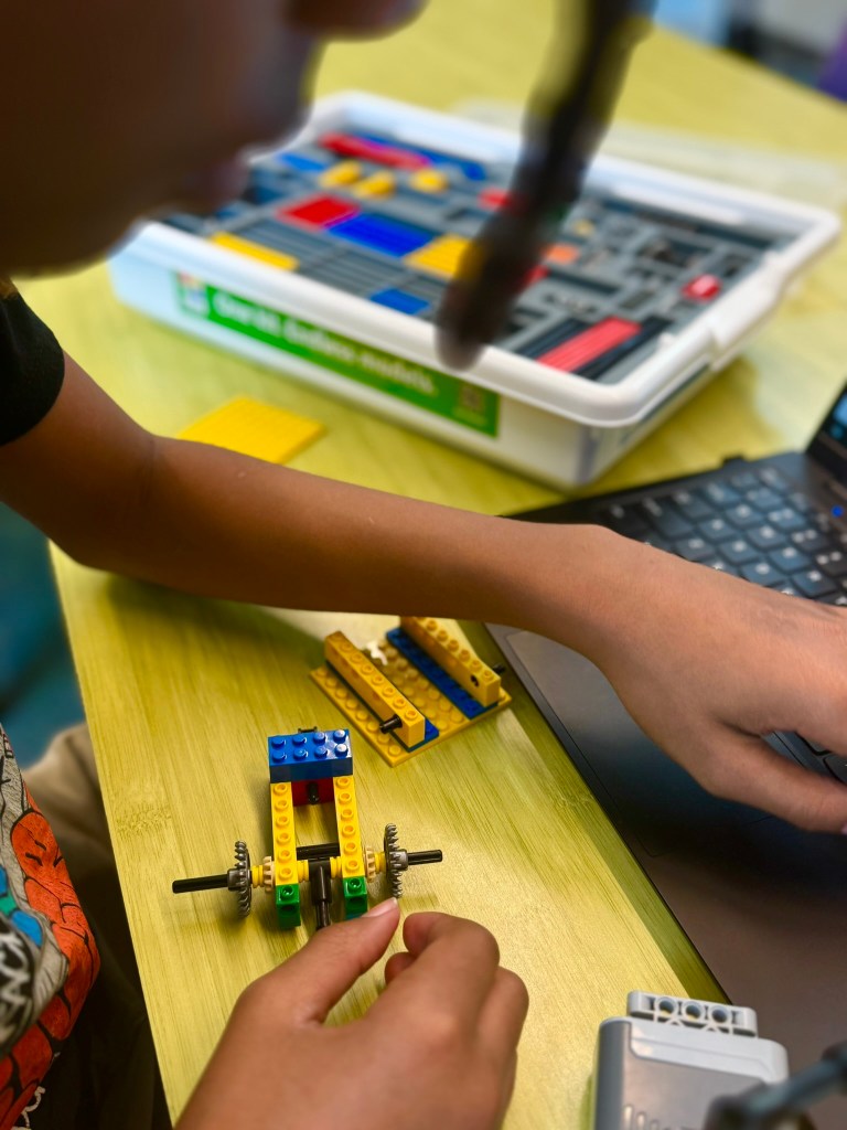 Student working through an iBrick homeschool STEM lesson at the library