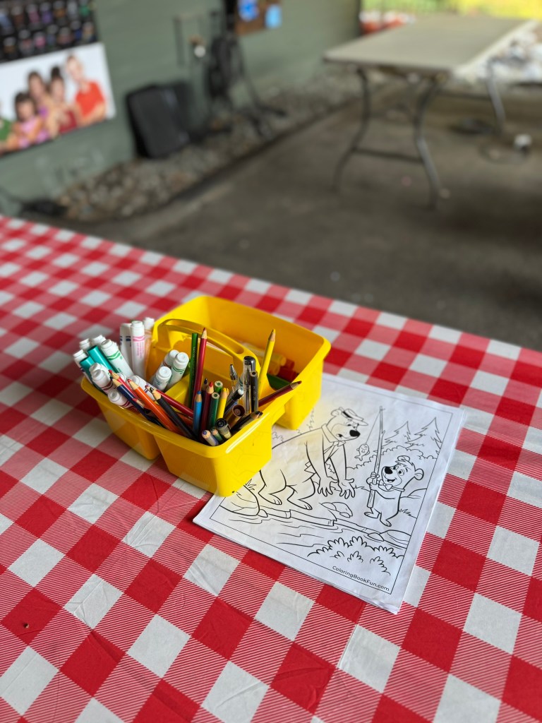 Yogi Bear coloring activity with crayons and markers at Jellystone Park Pigeon Forge