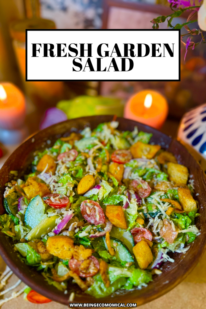 A bowl of fresh garden salad featuring leafy greens, cherry tomatoes, cucumber, red onion, and crunchy croutons, set against a warm, softly lit background.