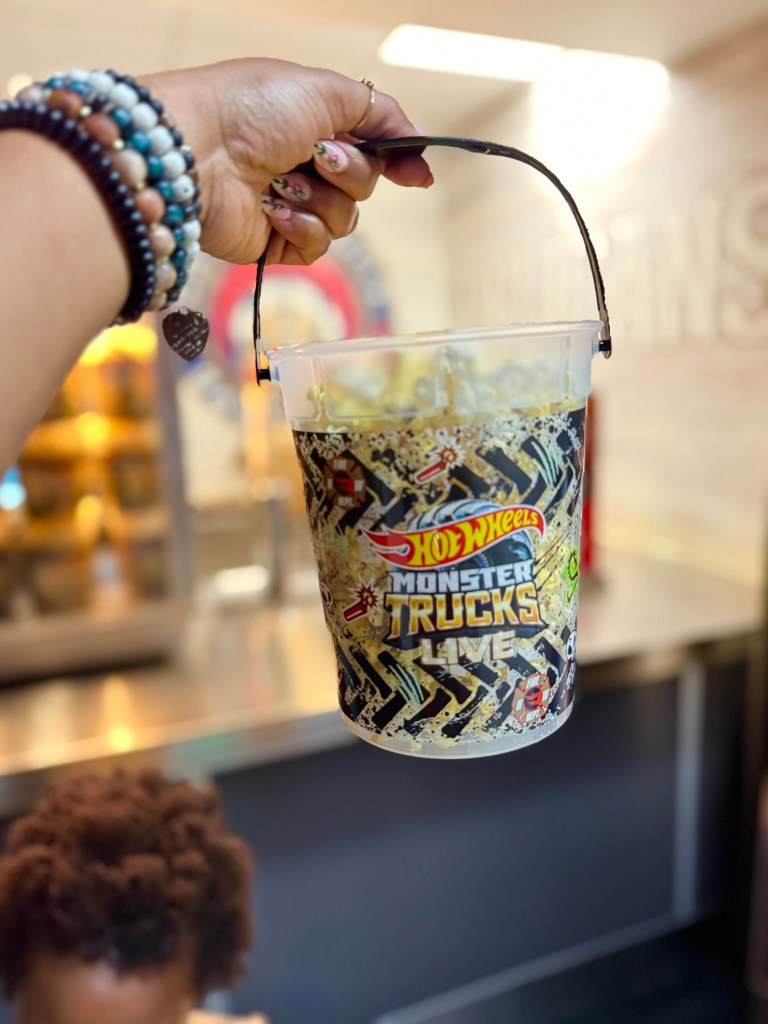 Hot Wheels Monster Trucks Live souvenir popcorn bucket held inside the arena.