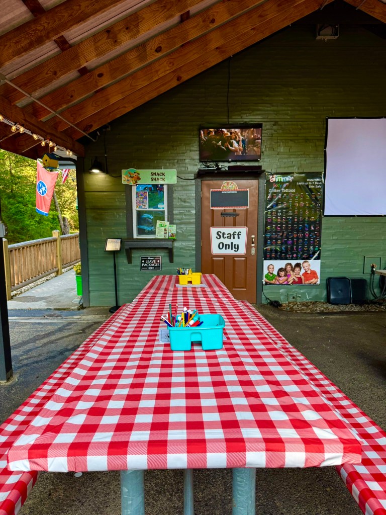 Activity tables inside the recreation area at Jellystone Park Pigeon Forge