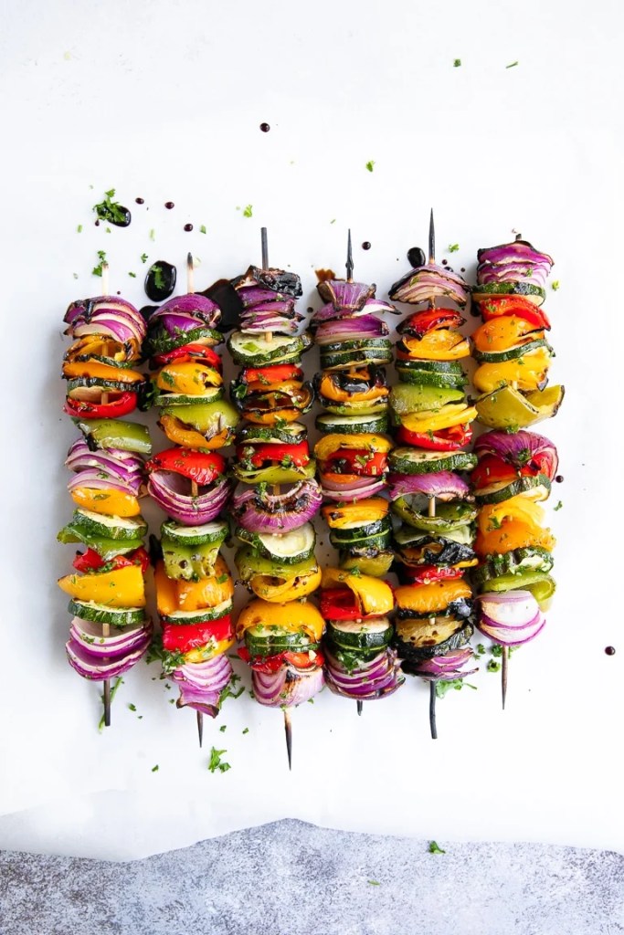 Grilled veggie skewers with colorful summer vegetables for a healthy cookout side or dinner.