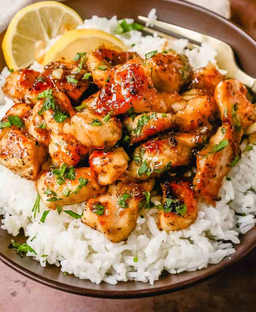 Honey chicken with a sweet and savory glaze served over rice for an easy weeknight dinner.