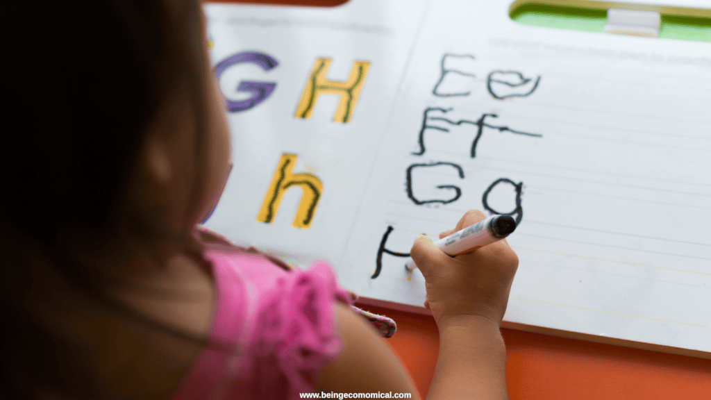 3-year-old practicing uppercase and lowercase letters in an early writing activity