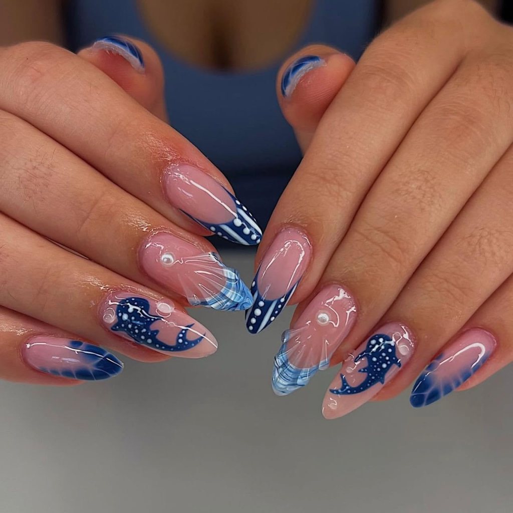 blue ocean french tip nails with wave and seashell design