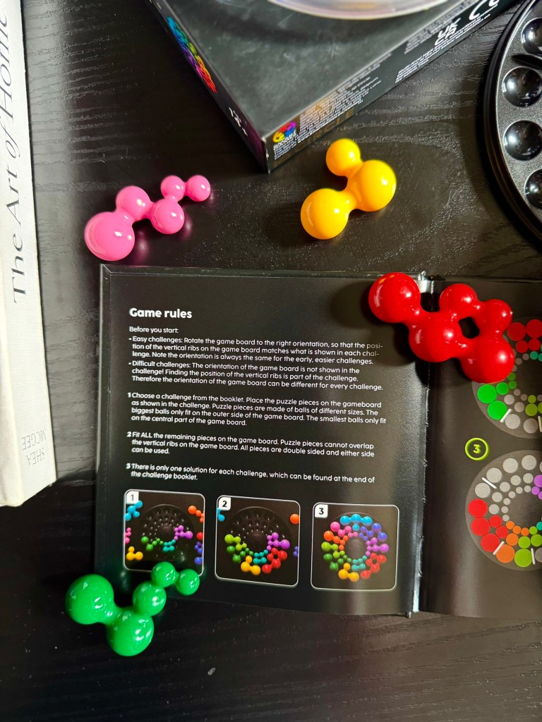 IQ Circle game rules and instructions shown beside colorful puzzle pieces
