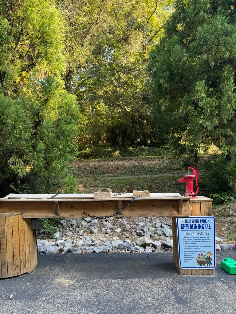 Gem mining station with water pump at Jellystone Park Pigeon Forge