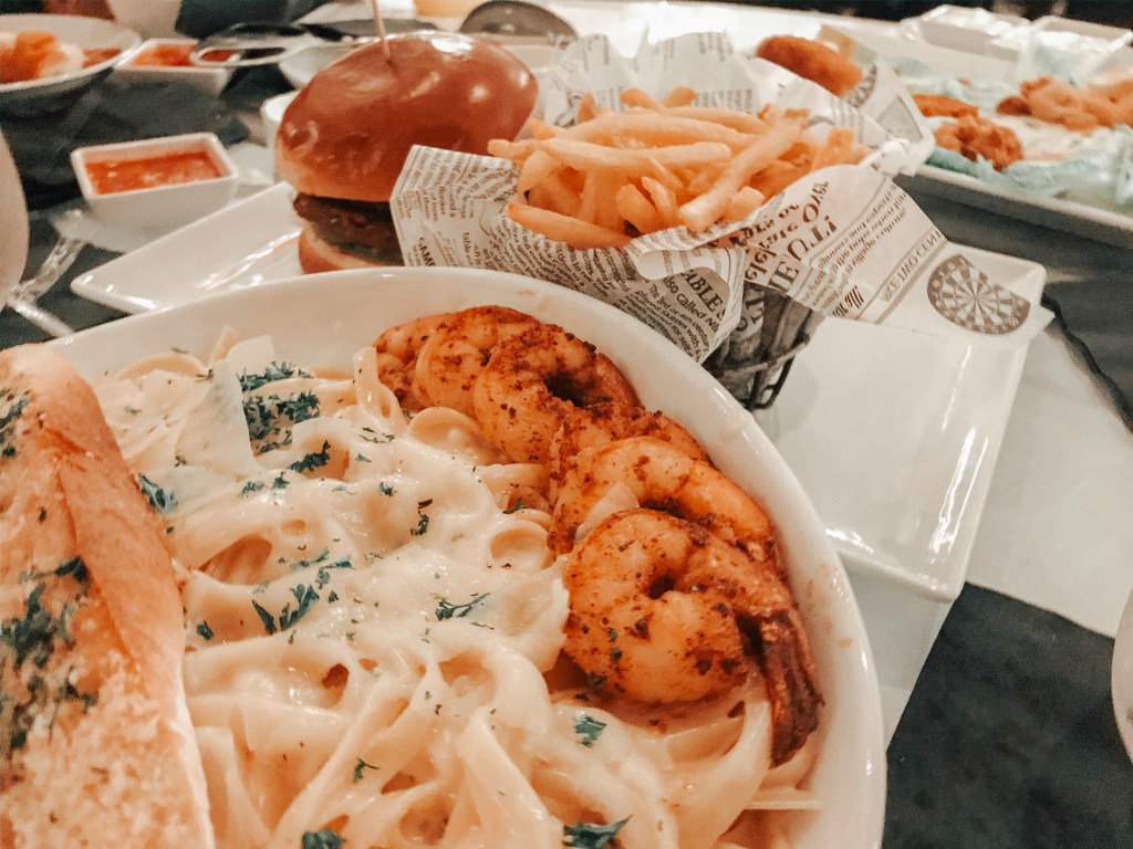 Creamy shrimp Alfredo served with garlic bread at Sugar Factory Biloxi.