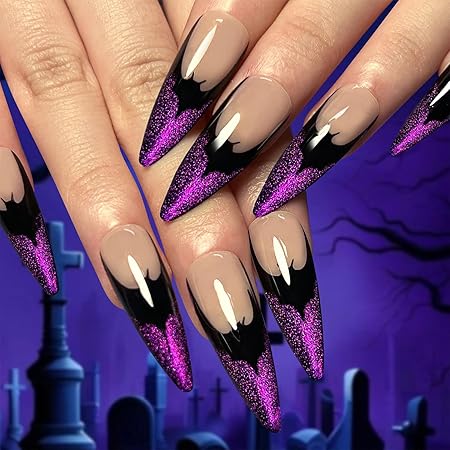 Sleek stiletto nails featuring a gradient design from nude to black, accented with glittery purple tips, set against a spooky graveyard background.