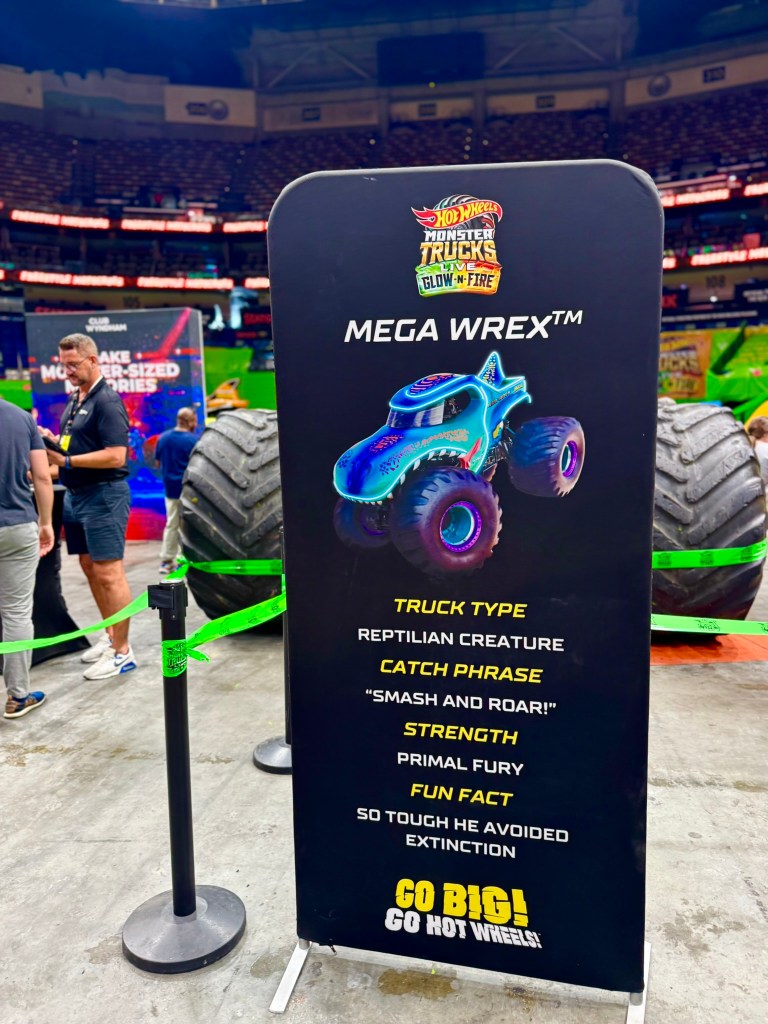 Mega Wrex information sign describing the reptilian Hot Wheels monster truck during the preshow.