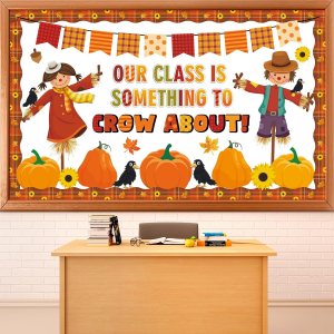 Colorful classroom bulletin board featuring a harvest theme with scarecrows, pumpkins, and crows, containing the message 'OUR CLASS IS SOMETHING TO CROW ABOUT!'