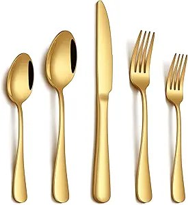 Set of gold-colored cutlery including spoons, forks, and a knife arranged neatly.