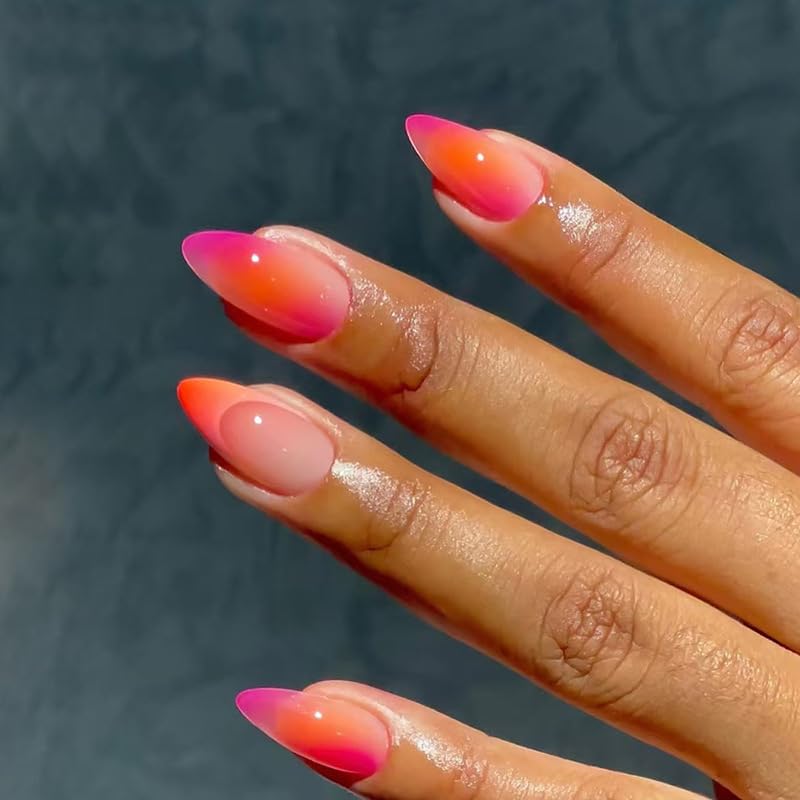 Almond nails with blended orange and pink ombre gradient design