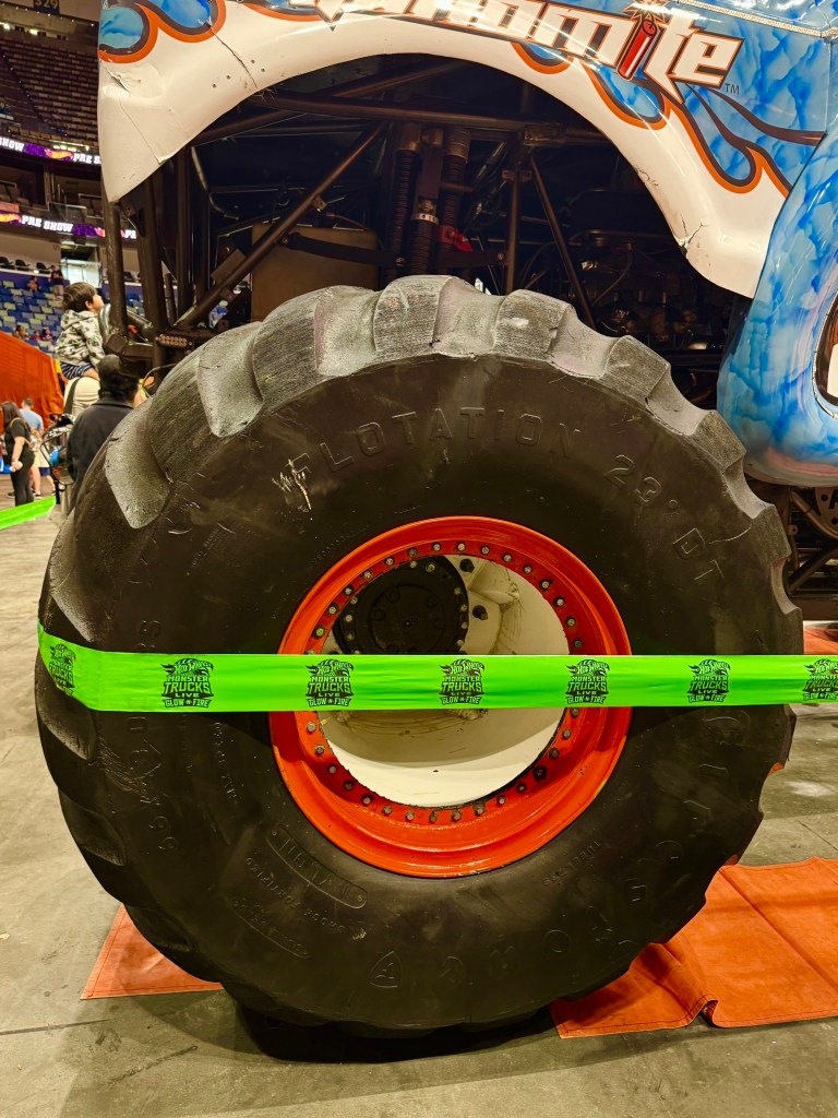 Massive monster truck tire viewed up close during the Hot Wheels Monster Trucks Live preshow.