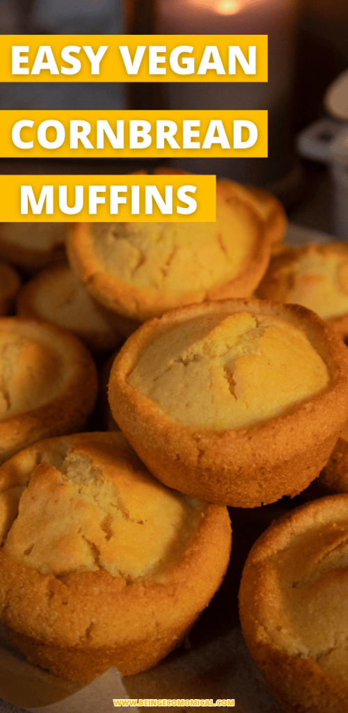 Baked vegan cornbread muffins arranged closely together, showcasing their golden-brown tops and fluffy texture.