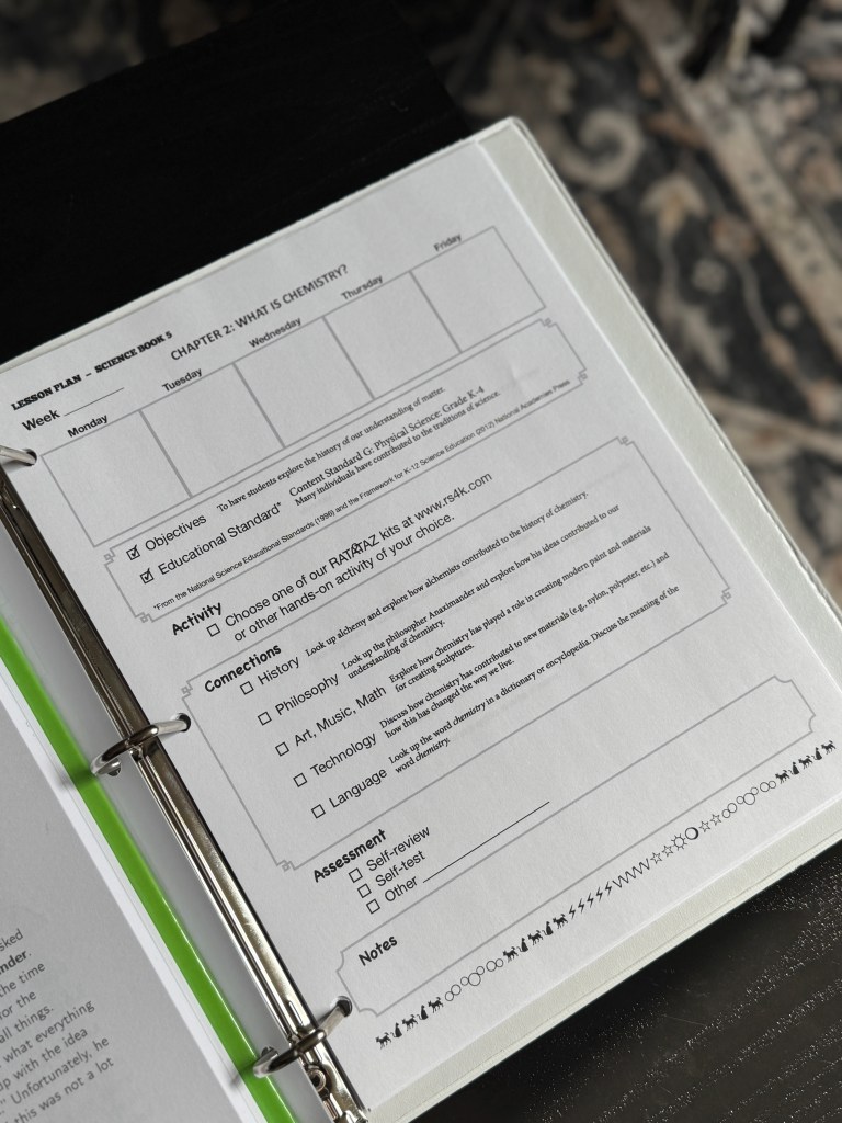 Open lesson plan page for Real Science-4-Kids Book 5, featuring a weekly schedule, objectives, connections, assessment options, and space for notes.