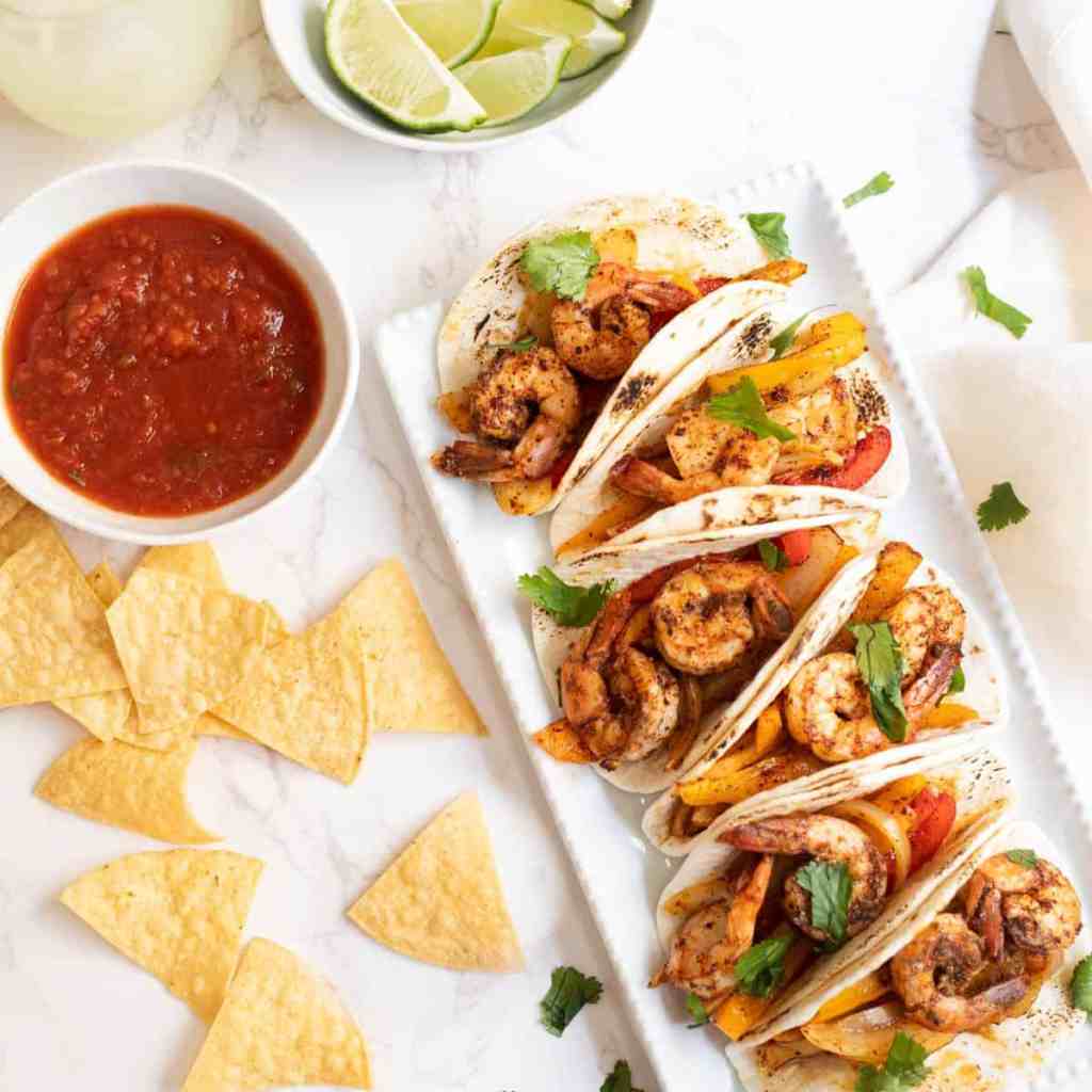 Sheet pan shrimp fajitas with peppers and onions roasted together