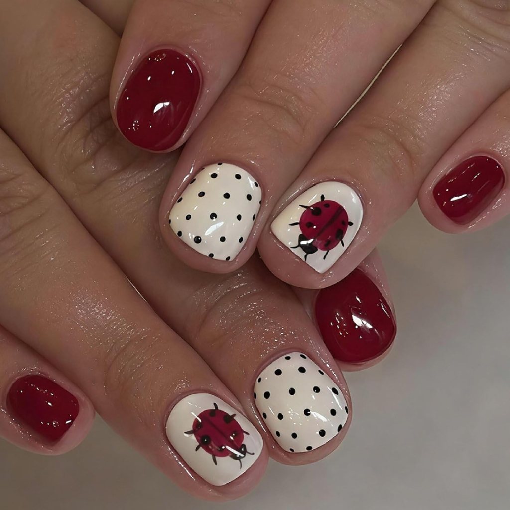 cute red ladybug summer nails with polka dots on short natural nails
