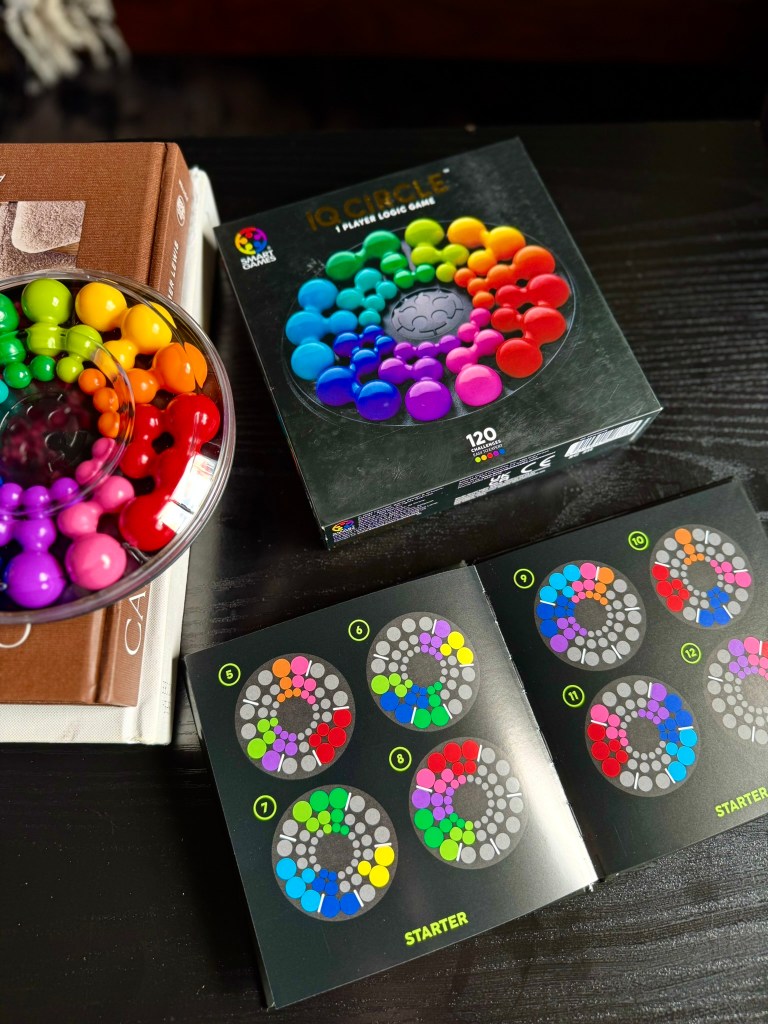 SmartGames IQ Circle box displayed with the included challenge booklet