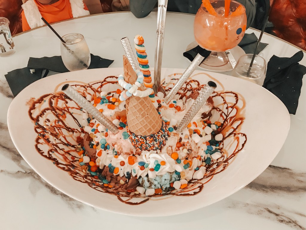 The famous King Kong Sundae topped with ice cream, whipped cream, cookies, and candy at Sugar Factory Biloxi.