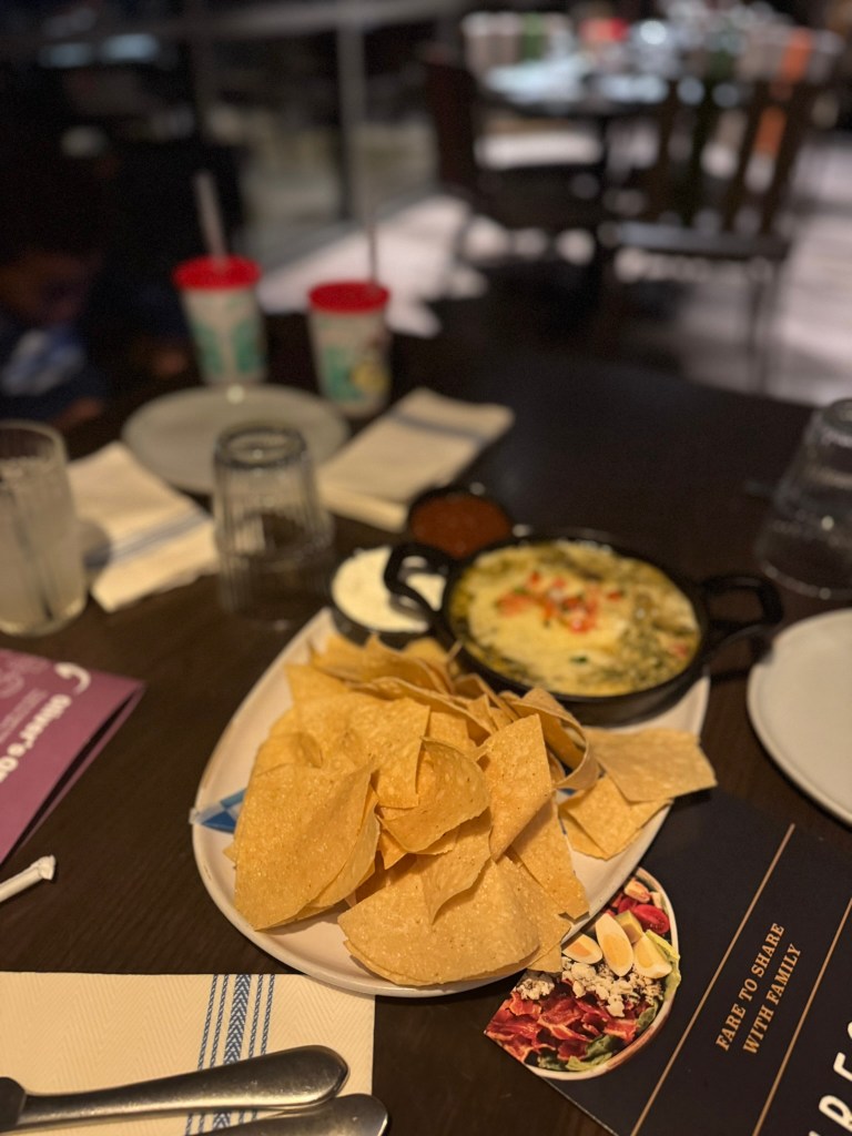 Fireside restaurant appetizer spinach and artichoke dip on table at Great Wolf Lodge in Grapevine, Texas 