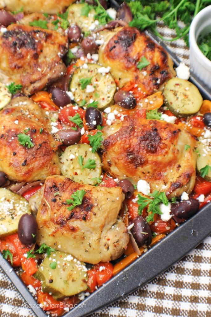 Greek chicken sheet pan dinner with roasted vegetables and lemon seasoning