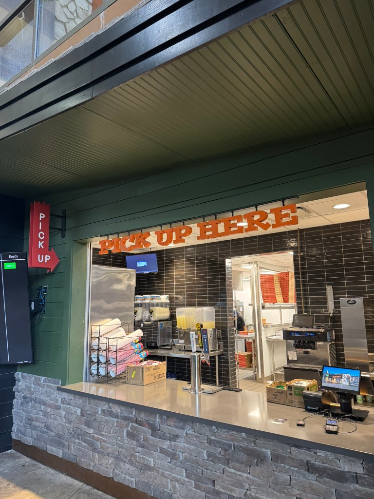 pick up counter at The Hungry Wolf Food Hall in Great Wolf Lodge in Grapevine, Texas