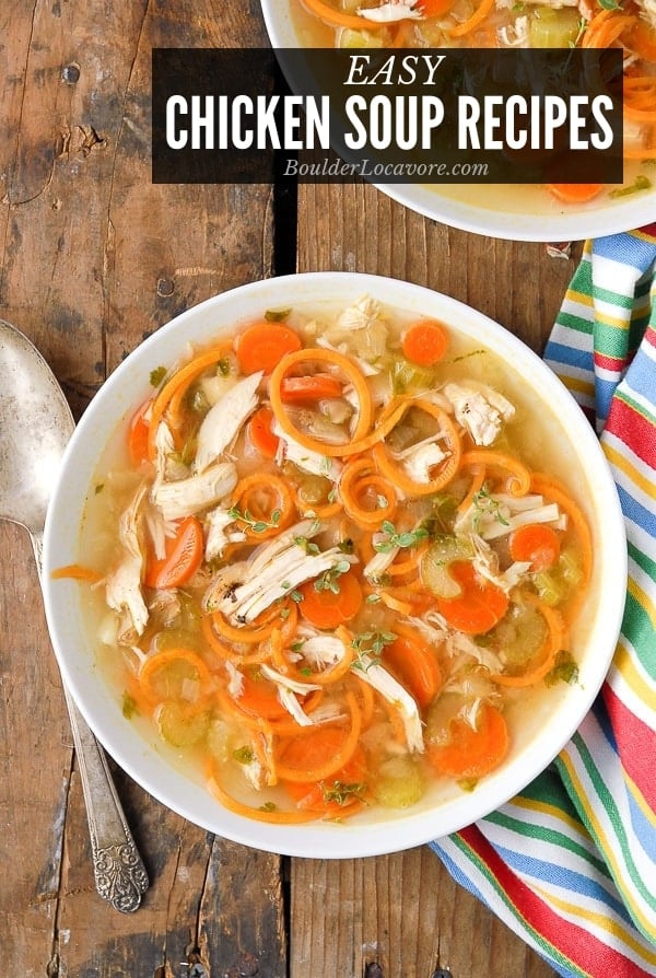 Classic homemade chicken soup with shredded chicken, carrots, celery, and noodles served in a rustic bowl
