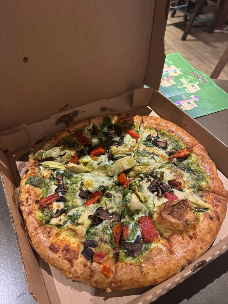 Farmer's pizza with vegetables at Hungry Wolf Food Hall at Great Wolf Lodge in Grapevine, Texas 