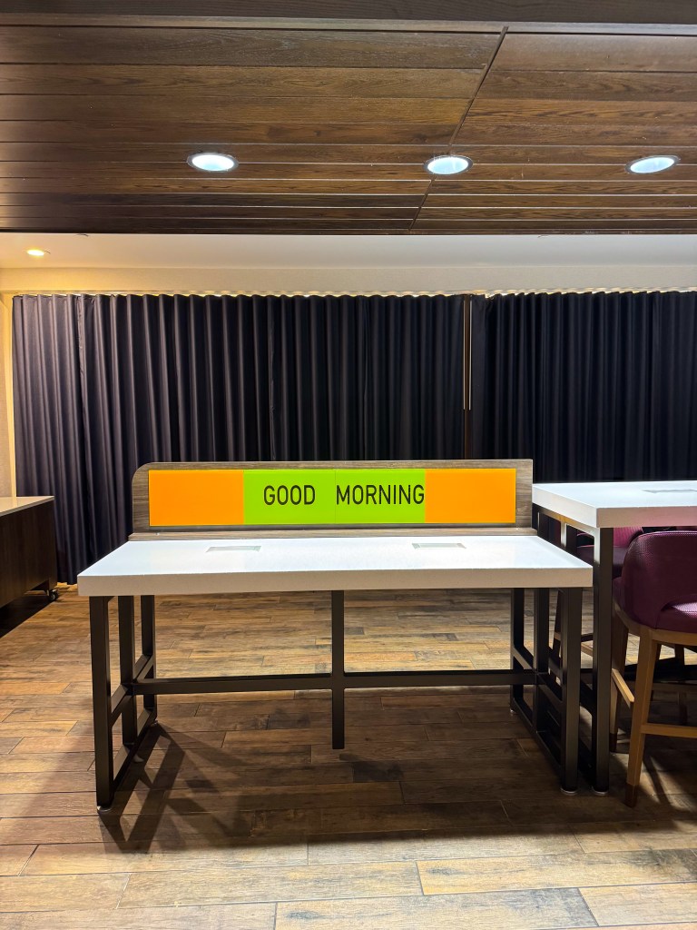 Breakfast serving area with Good Morning sign at Home2 Suites Pigeon Forge.